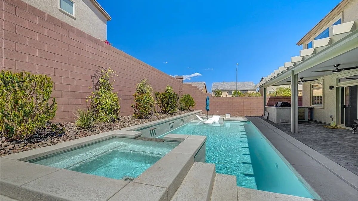 Resort-style pool and spa at 8603 Hallcrest Ct, Las Vegas luxury home