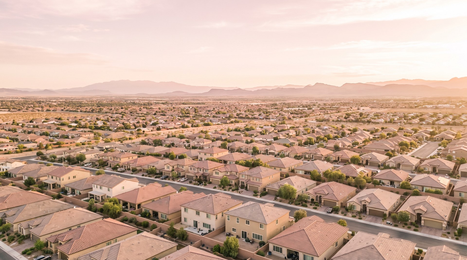 Aerial view over Las Vegas valley neighborhoods at sunset